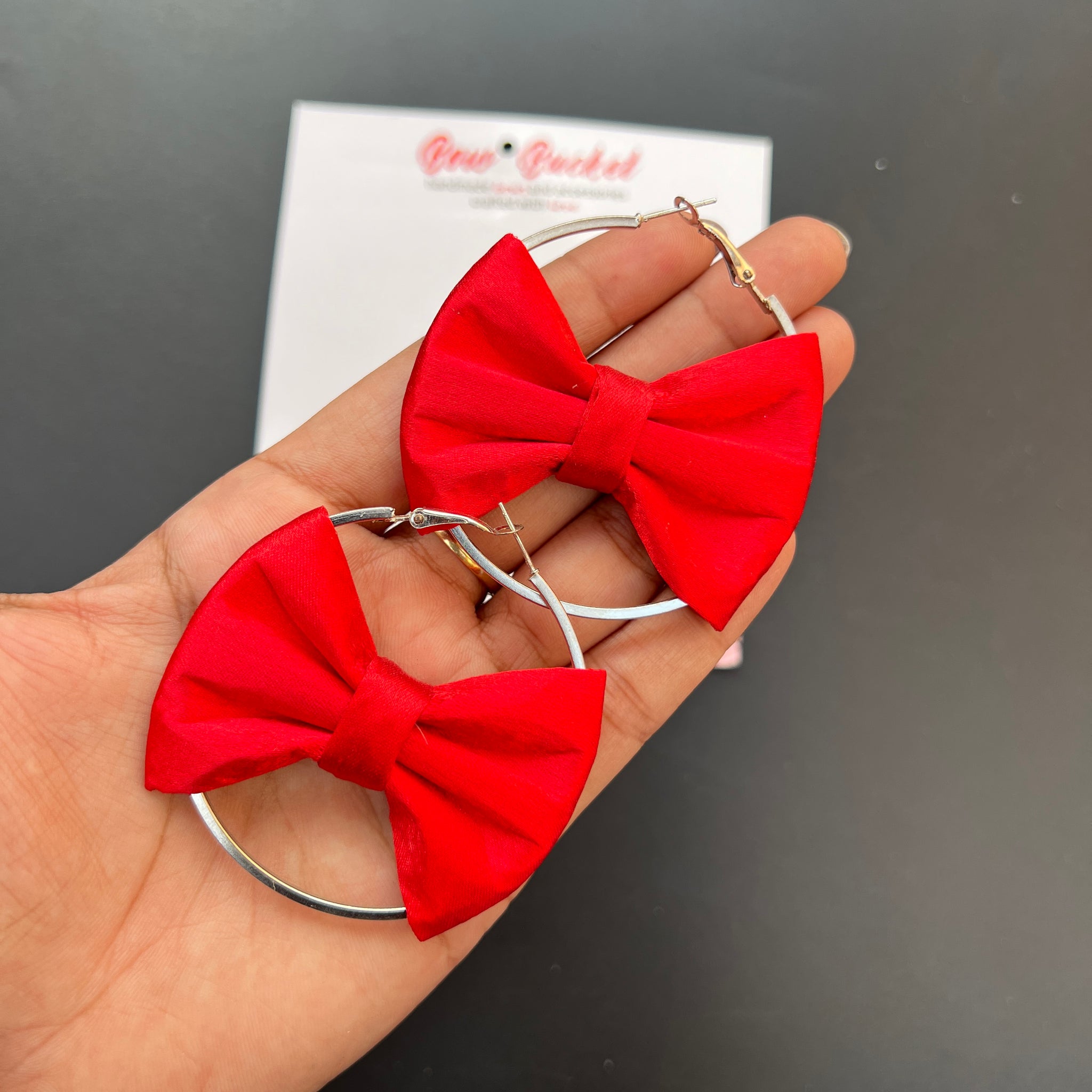Red satin bow earring