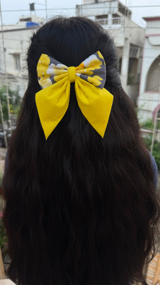 Yellow floral pigtail bow