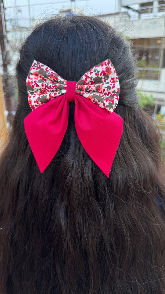 Pink floral pigtail bow