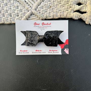 Black glitter bow