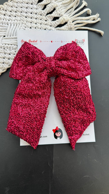 Pink sequence butterfly bow