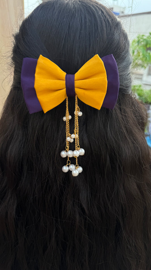 Yellow purple hanging pearl bow