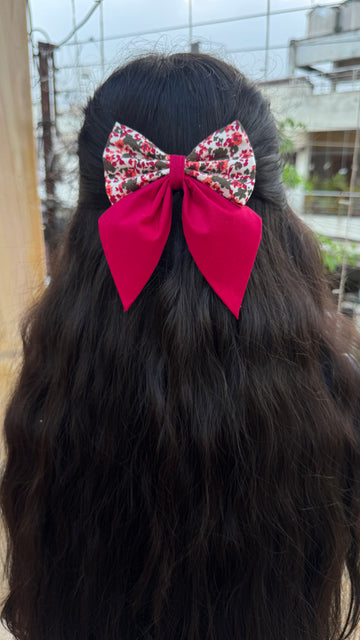 Pink floral pigtail bow