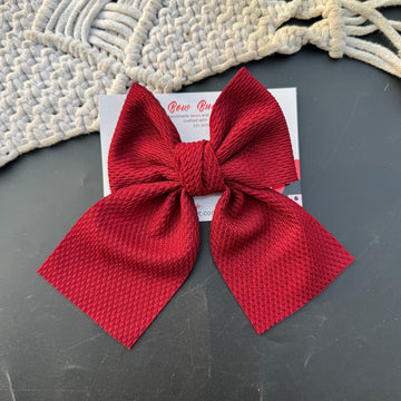 Maroon pigtail bow