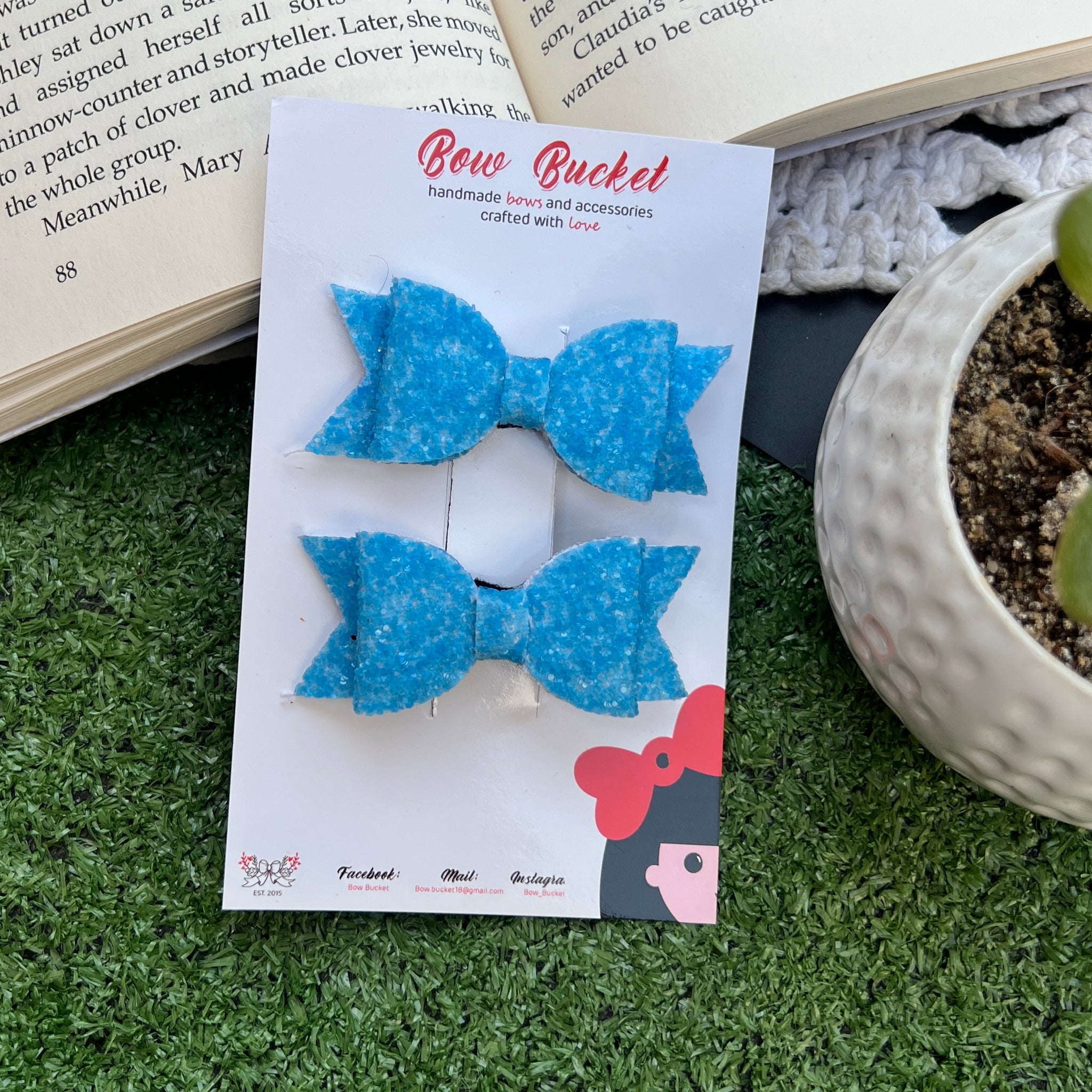 Blue glitter mini bow clip