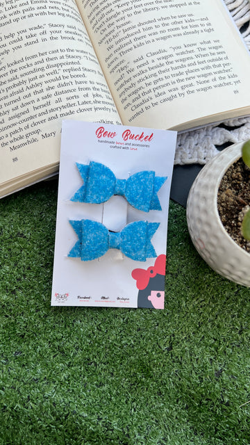 Blue glitter mini bow clip