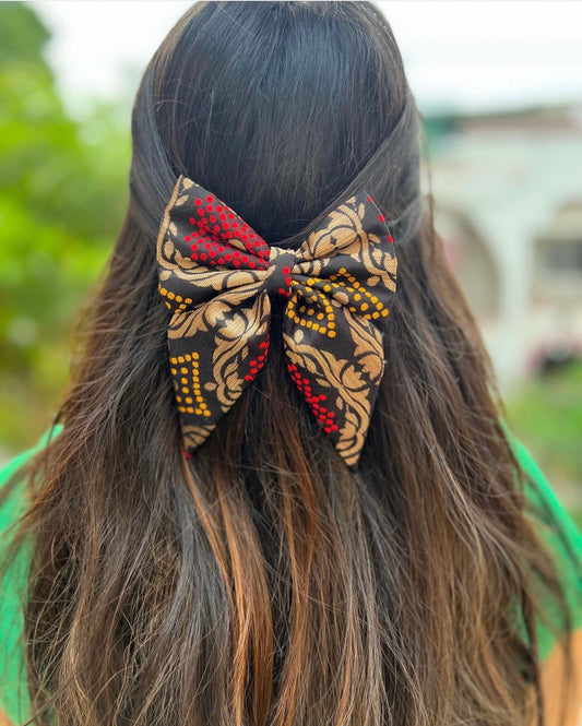 black golden pigtail traditional bow
