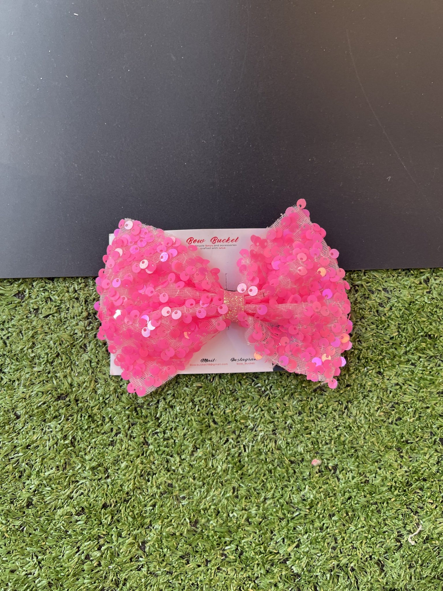 neon pink sequence bow