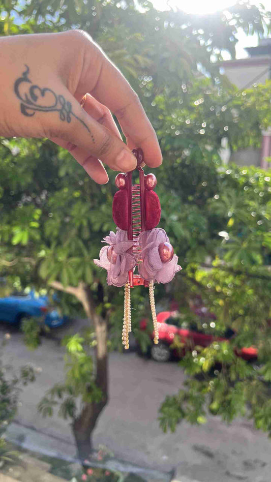 maroon flower banana clutcher
