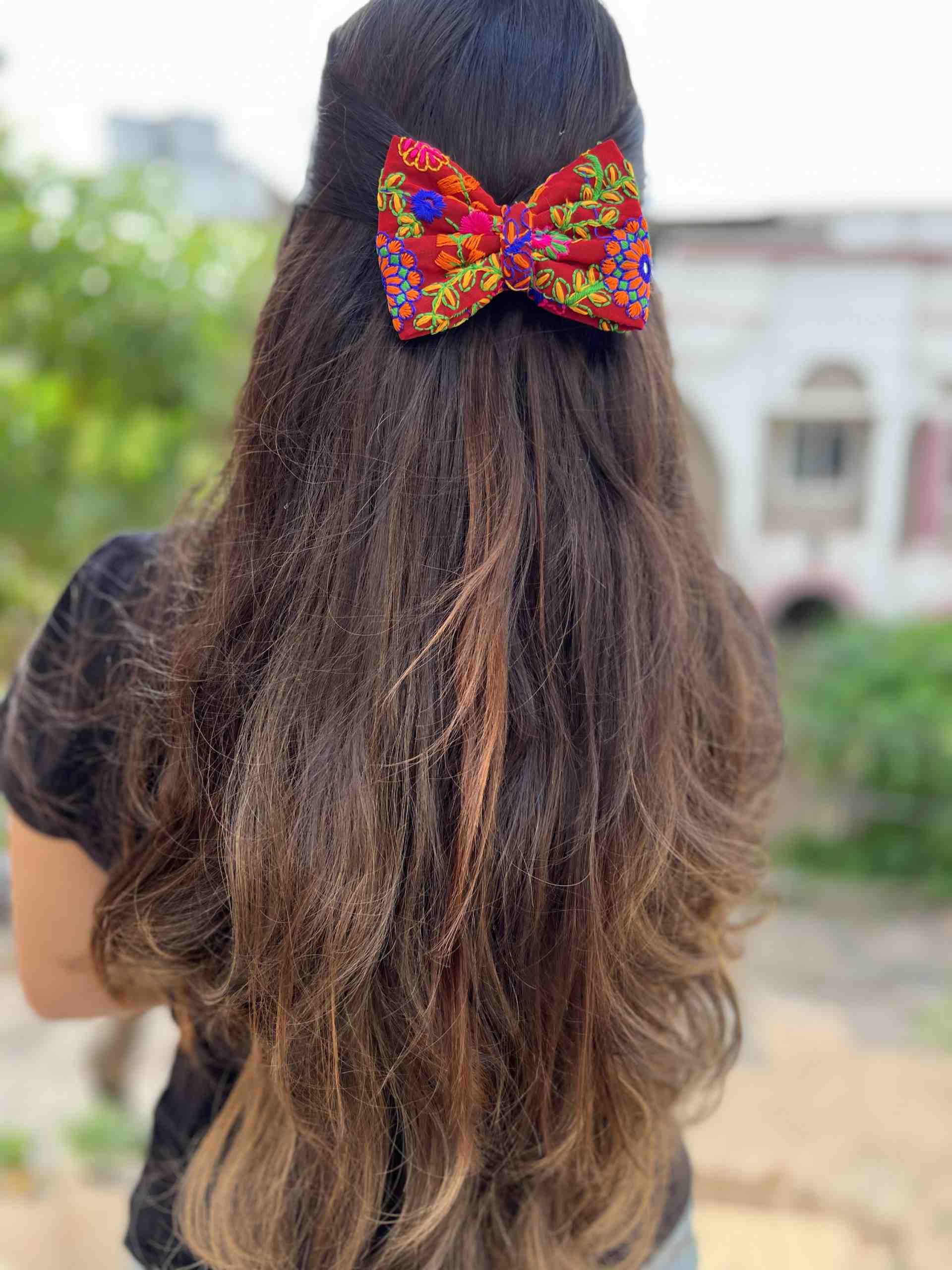 Red thread work traditional bow