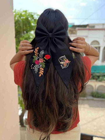 Black floral embroidery bow with initial