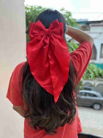 Red ruffle bow