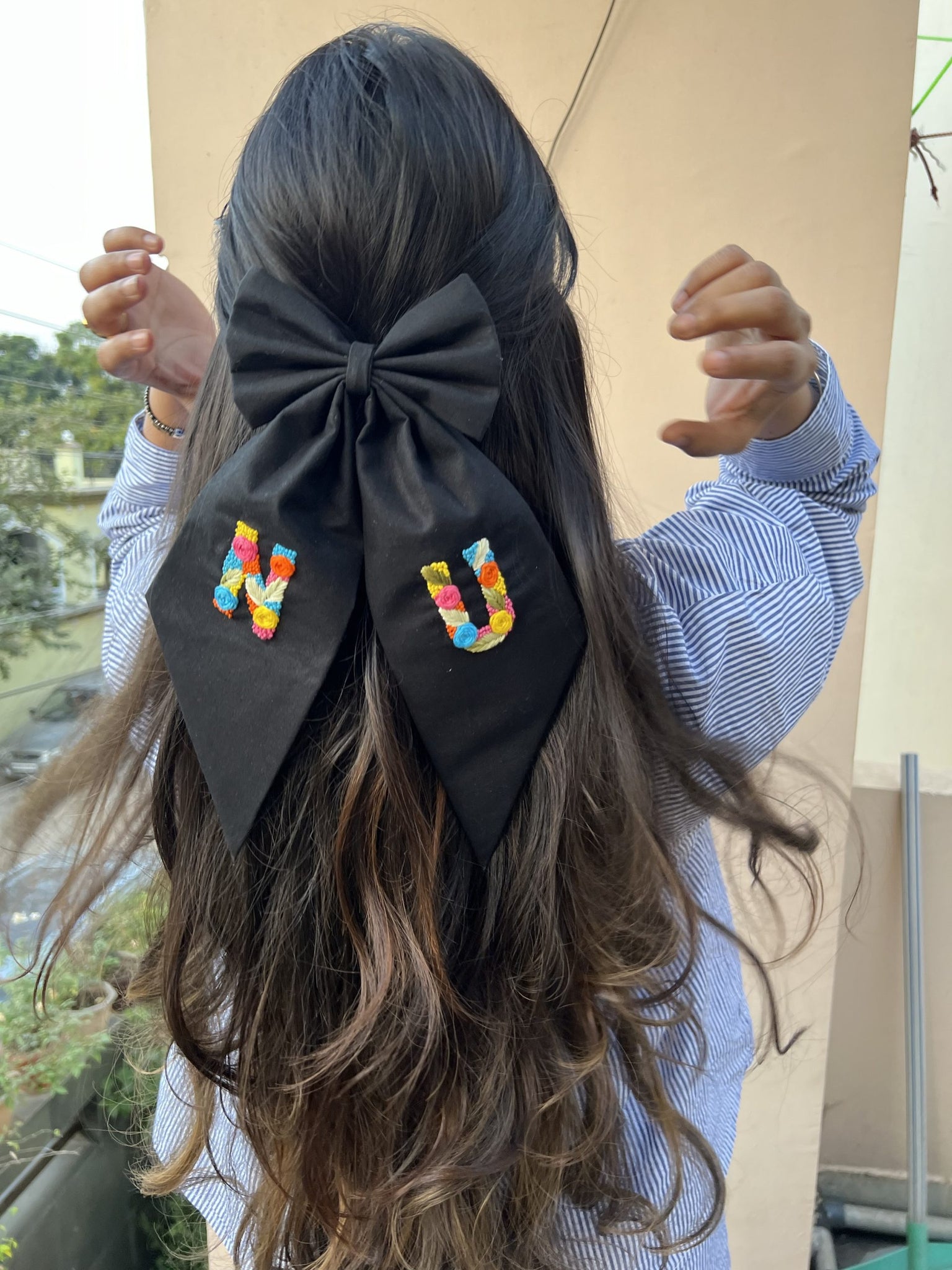 Black embroidered bow with initials