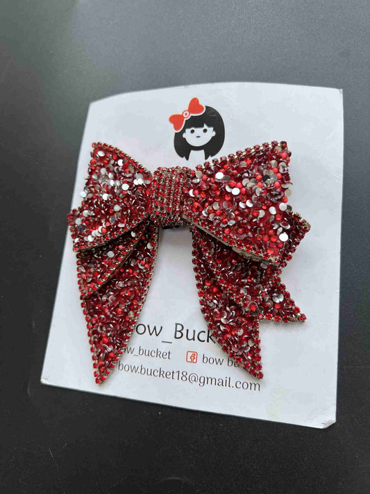 red lady swarovski bow clip