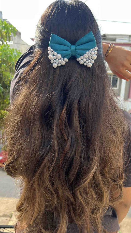 Teal green pearl bow