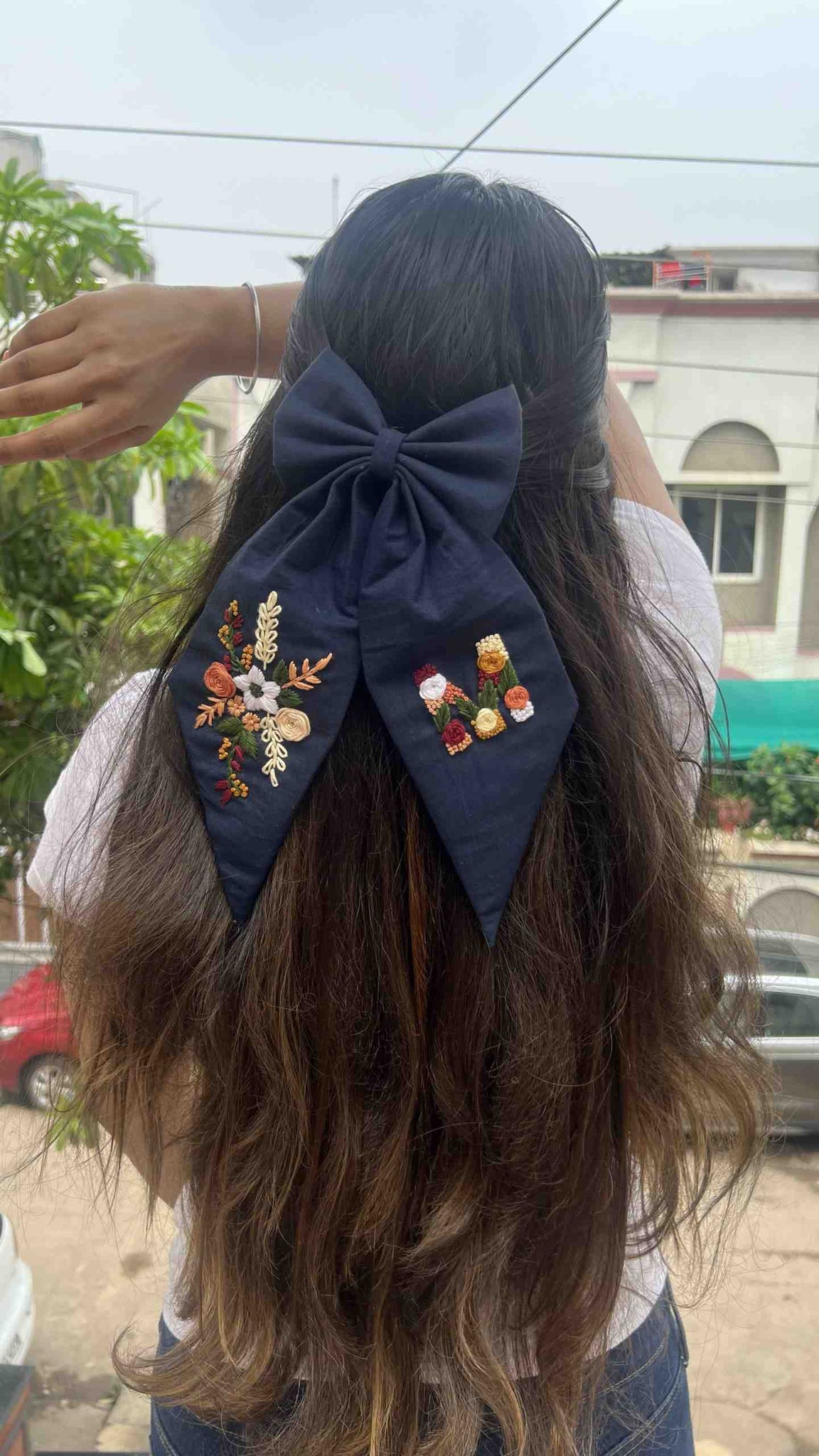 Navy blue floral embroidered bow with initial