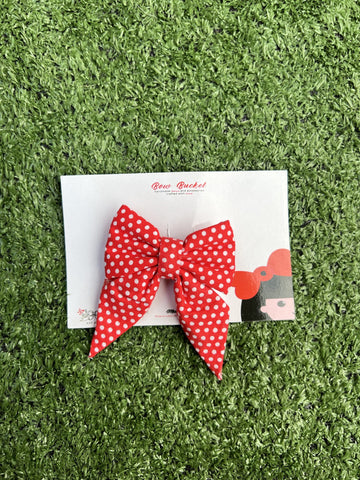 red polka pigtail bow