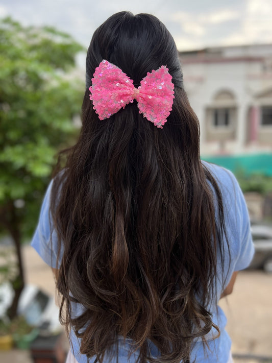 neon pink sequence bow