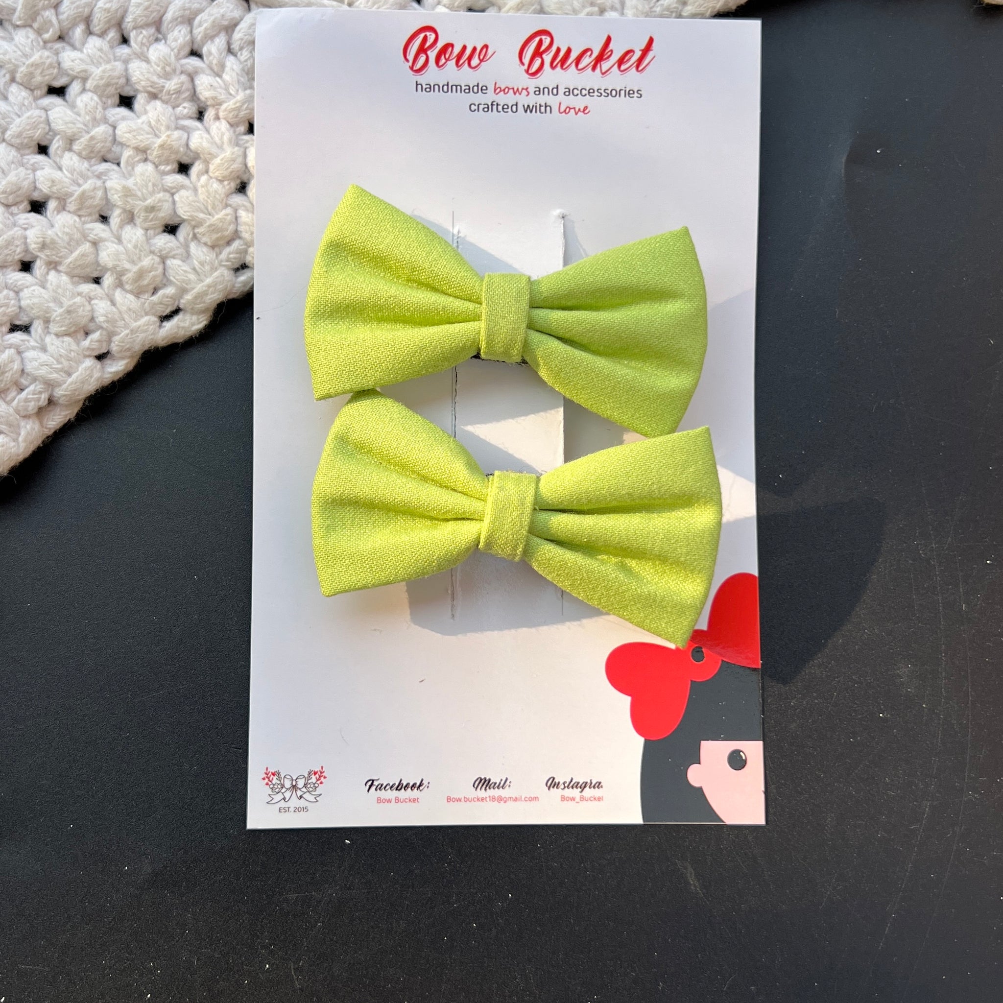 Pastel green mini bow clip