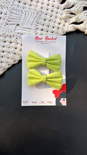 Pastel green mini bow clip