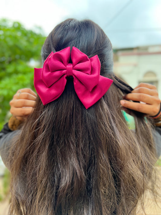 Magenta pink triple layer bow clip