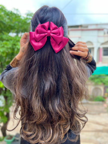 Magenta pink triple layer bow clip