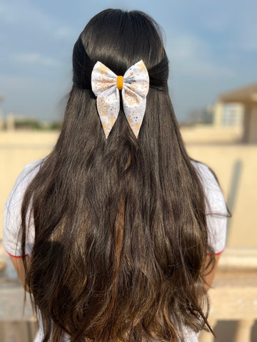 Golden garland pigtail bow clip  - size - 3"