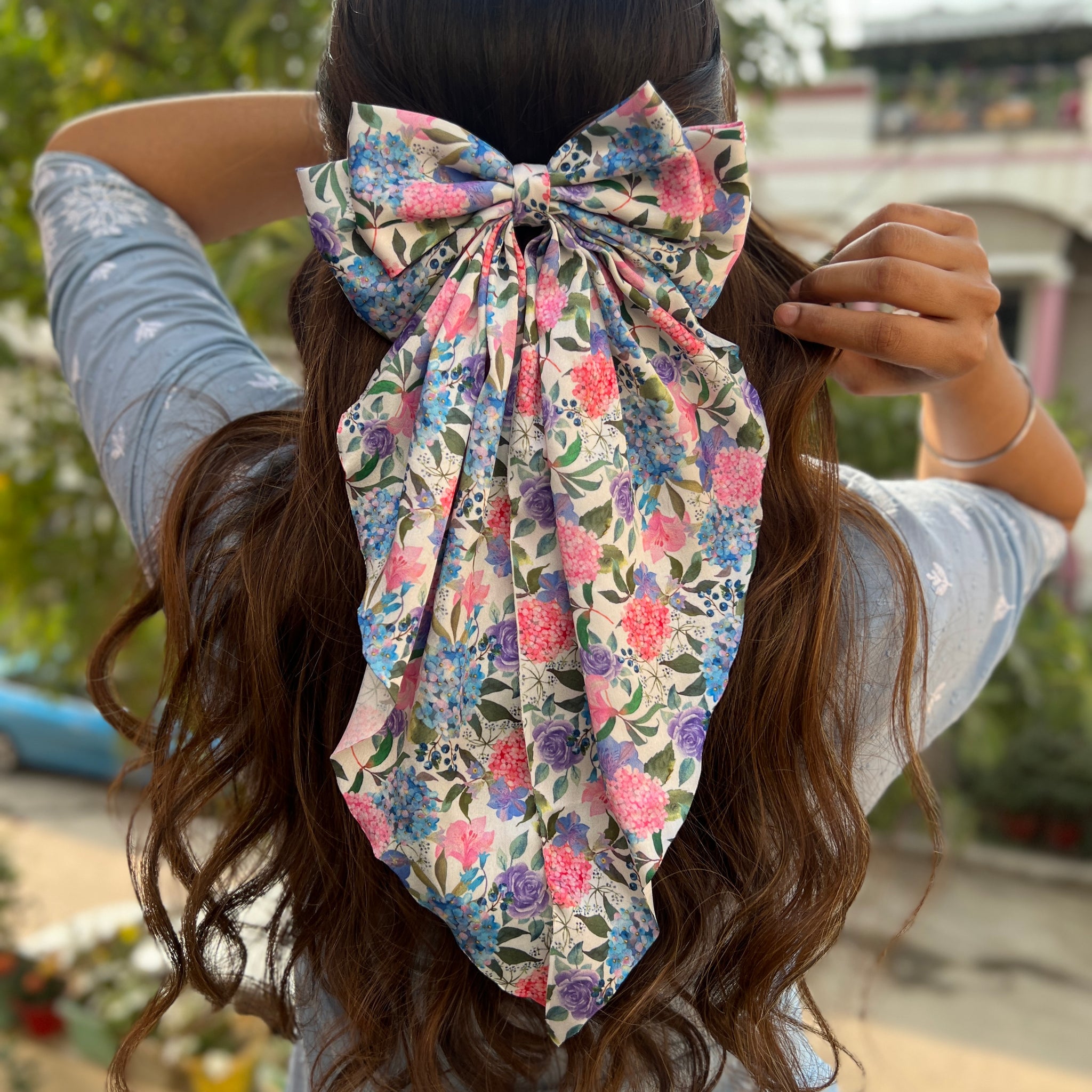 Blue floral ruffle bow