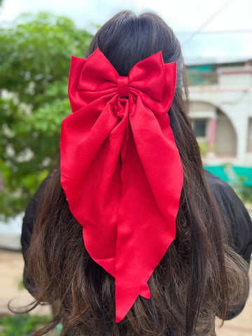 Red ruffle bow clip