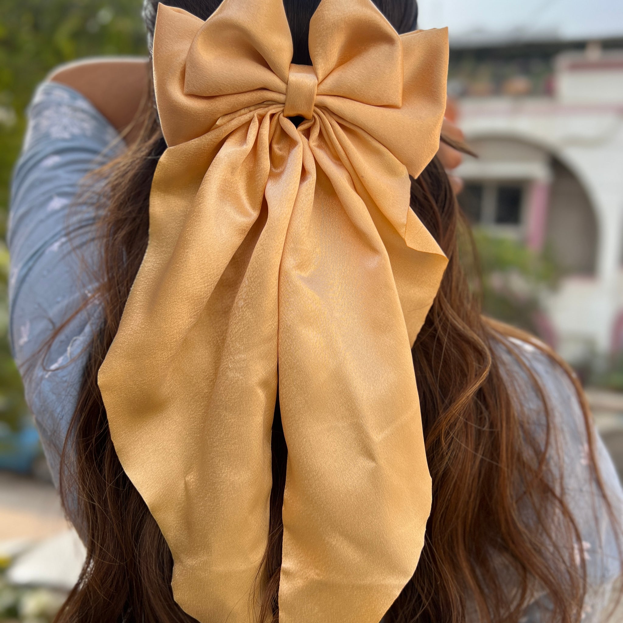 Golden ruffle bow